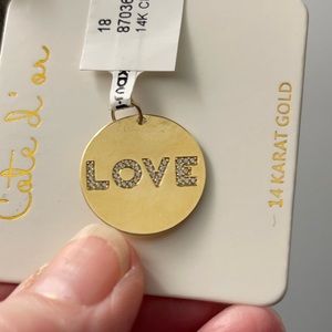 14Kt. gold disk charm, nice size, the word “Love” is on the front!